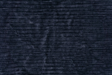 Navy blue fabric velvet texture close up