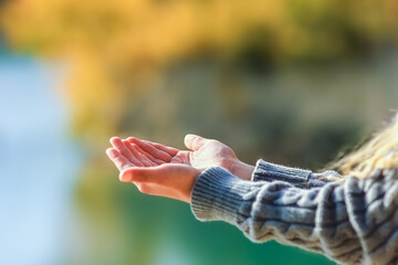 A Happy hands of a child on nature in the park travel