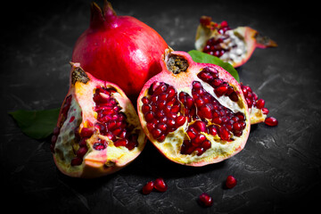 fresh pomegranate fruit on concrete background