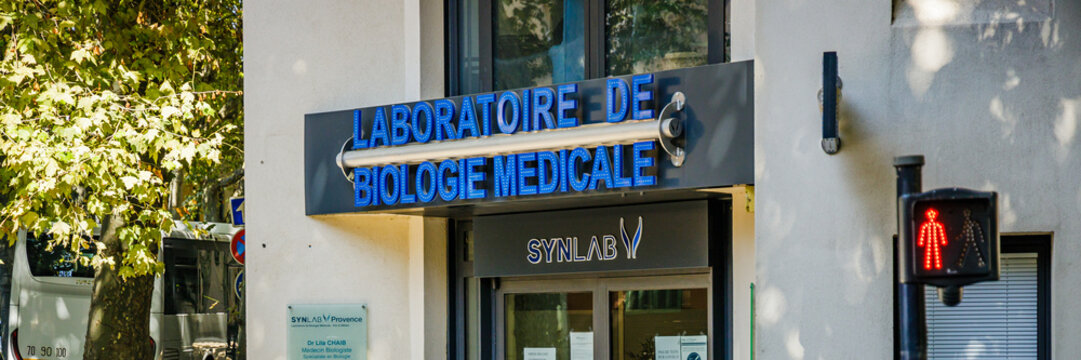 Synlab medical biology laboratory sign at the entrance of the building in Aix en Provence, France