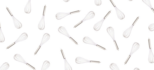 Pattern metal kitchen whisk for whisking on a white isolated background