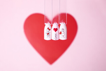 Romantic color palettes of nail gel polish for manicure and pedicure nails, heart design