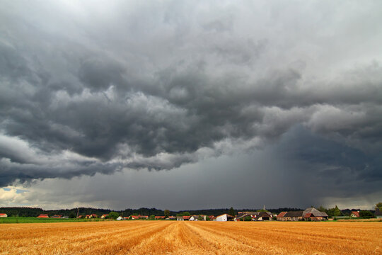 Dark and threatening clouds of a thunderstorm at night