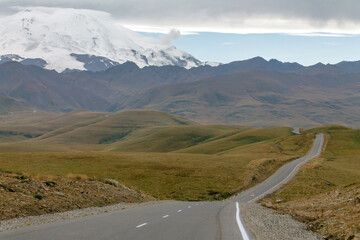 road among mountains to great mountain