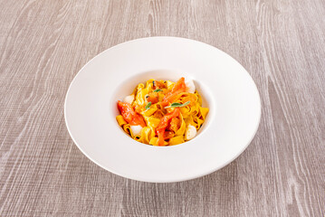 Pappardelle is a kind of wide tagliatelle. From the verb 