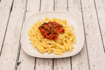 puttanesca sauce is a sauce to accompany pasta, typical of central Italy