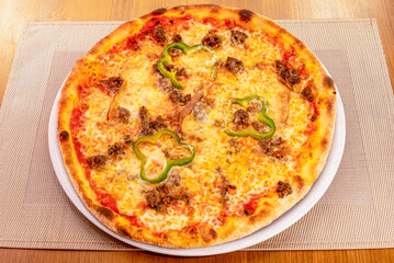 The pizza di Melanzane makes you fall in love with delicious aubergines au gratin made on a base. A unique, simple and delicious recipe