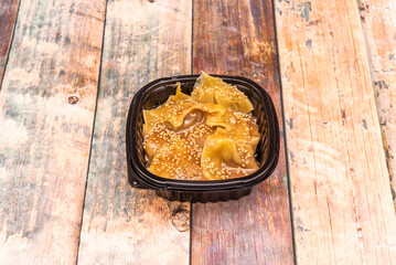 Sichuan ravioli, the combination of salty, sour, creamy and sweet in this peanut sauce, added to the texture of the accompanying pasta, is so tasty