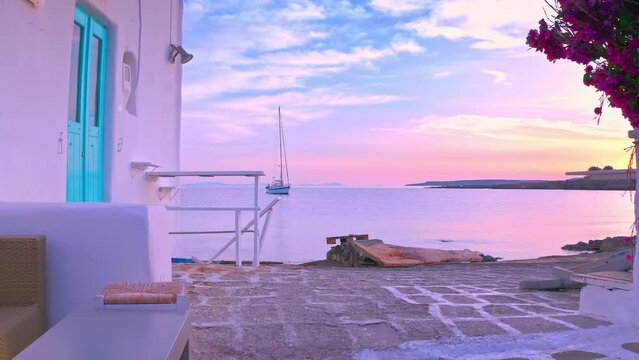 Mediterranean sea sunset on shore of Paros island in Greece. Travel to Cyclades