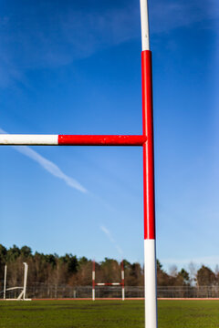 rugby field,  perspective view of rugby posts on a blue sky background