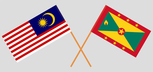 Crossed flags of Malaysia and Grenada. Official colors. Correct proportion
