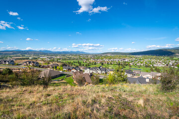 View of the cities of Liberty Lake, Spokane Valley, Otis Orchards and Post Falls from a hilltop in...