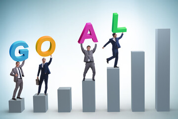 Businessman in goal concept carrying letters