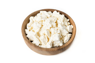 Cottage curd cheese in a wooden bowl isolated on a white background. Homemade milk food.