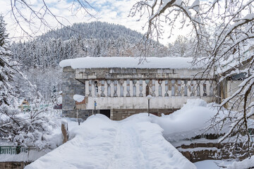 Old Soviet building next to the winter lake Ritsa in Arkhaziain winter time