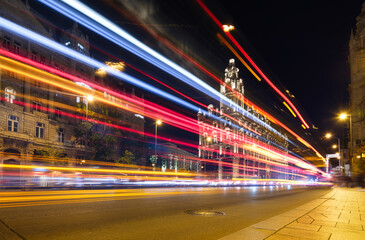The blurry lights of city traffic. Budapest, Hungary. Evening illumination of the building. High resolution photo.
