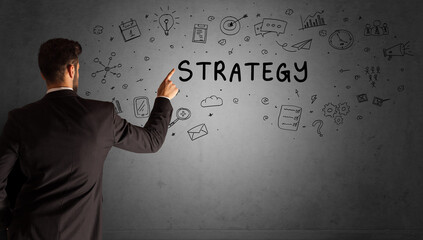 businessman drawing a creative idea sketch