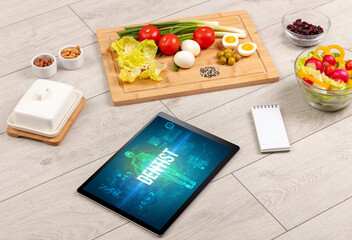 Tablet Pc with fruits, medical concept