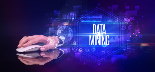 hand holding wireless peripheral, cyber security concept