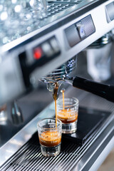 Preparing an express coffee in a professional coffee machine.