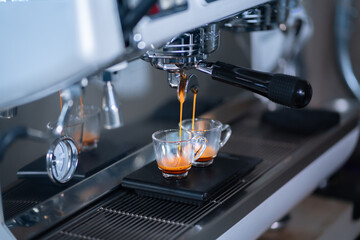 Preparing an express coffee in a professional coffee machine.