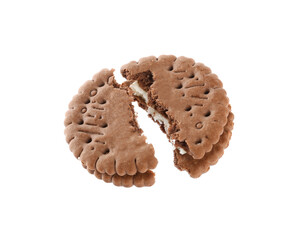 Broken tasty chocolate sandwich cookie with cream on white background