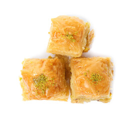 Delicious baklava with pistachios on white background, top view