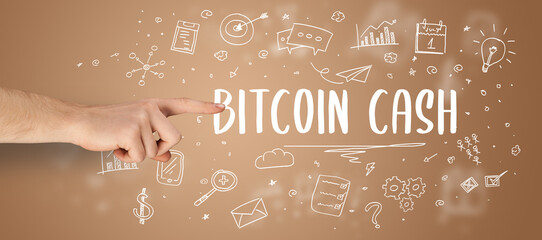 Close-Up of cropped hand pointing at business inscription