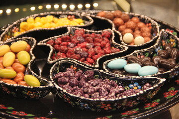 colorful delicious marmalade jelly candies on counter of shop, grocery, market, cafe - close up view. Dessert, sale, sweet food and confectionery concept