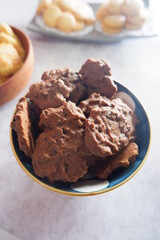 homemade chocolate cookies in a bowl, on a gray background. snacks, biscuits, made from flour, eggs, and sugar are eaten at tea time. snack time. close up