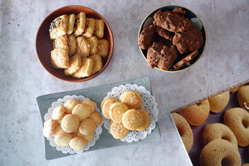 homemade cookies. assorted pastries on a marble table. christmas cookies. Pastries are made of flour, eggs, sugar and cheese. delicious pastries. close up