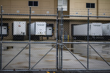 Sliver metal gate to industrial wear house 