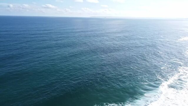 360 Aerial pan shot with drone of ocean and entire shoreline of George, South-Africa.