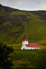 Early morning on the small red and white church in Vík Í Mýrdal, South Coast, Iceland