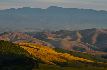 The bare hills of the Vale do Paraíba below the Serra da Bocaina range from the Mirante do Ultimo Adeus, or Last Goodbye Viewpoint, Itatiaia National Park, Itatiaia, Rio de Janeiro, Brazil