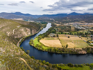 High angle aerial drone view of River Derwent, one of the major rivers on the island of Tasmania, Australia, near the town of New Norfolk, 30 kilometres from Tasmanias Capital City Hobart.	 - obrazy, fototapety, plakaty