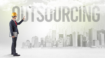 Fototapeta premium Young businessman with hard hat