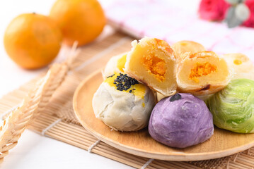 Chinese pastry stuffed with many sweet such as mung bean, egg yolk or custard