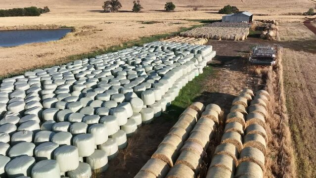 flying over hay and silage rolls and bales.