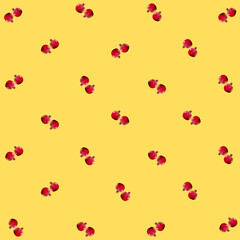 Colorful fruit pattern of fresh pomegranates on orange background. Top view. Flat lay. Pop art design