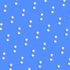 Colorful pattern of white zephyr on blue background. Marshmallow. Top view. Flat lay. Pop art