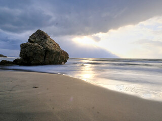 Fototapeta na wymiar Rocky seashore at sunset, 2022.1.30