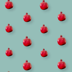 Colorful fruit pattern of fresh pomegranates. Top view. Flat lay. Pop art design