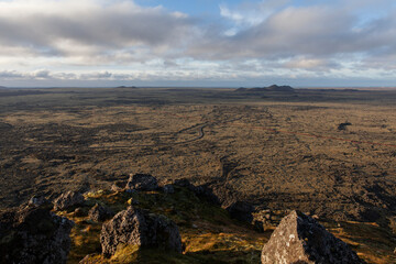Obraz premium Reykjanes peninsula panorama.A view from the top of the mountain Þorbjörn in Iceland .The mountain is beside the town of Grindavik and the Blue Lagoon
