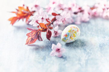 Simple Easter Decoration. Bright wooden background. Close up. Copy space.
