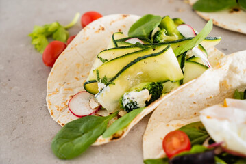 Tasty tortilla with fresh vegetables