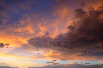 Fototapeta na wymiar Beautiful sunset with golden orange clouds background. Dramatic background.