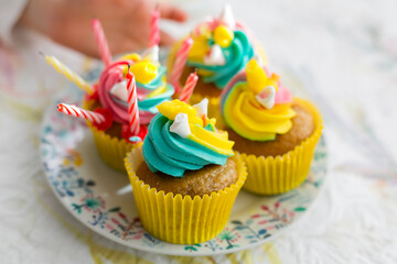 Colorful muffins with improvised birthday candles. 