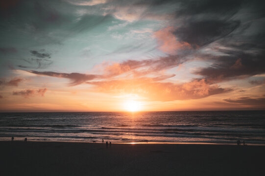 Last light of the day flares at Carmel Beach, Carmel-By-The-Sea, California © Tushar