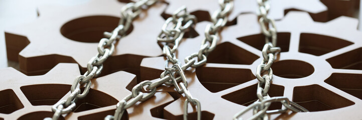 Engineering gears are connected and modified by chrome chain closeup